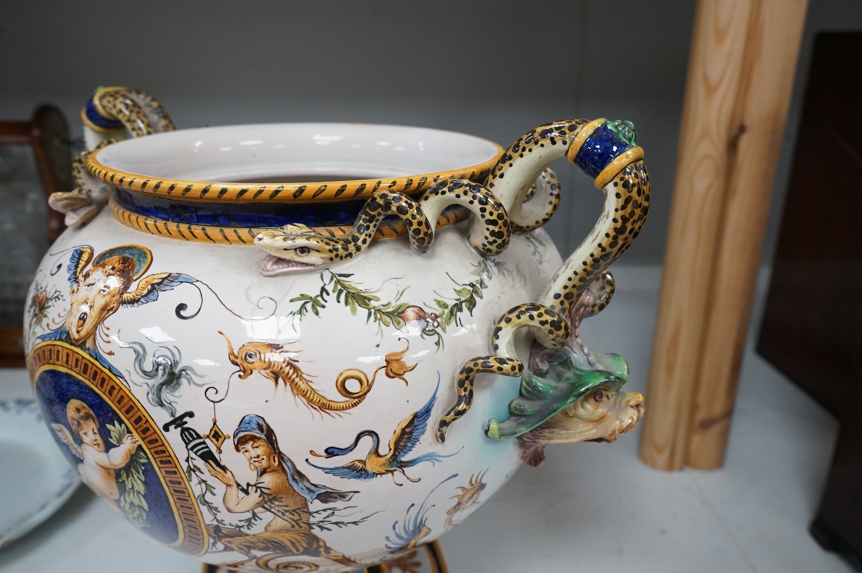 A large Ginori maiolica two handled pedestal vase, 34cm from base to top of handles